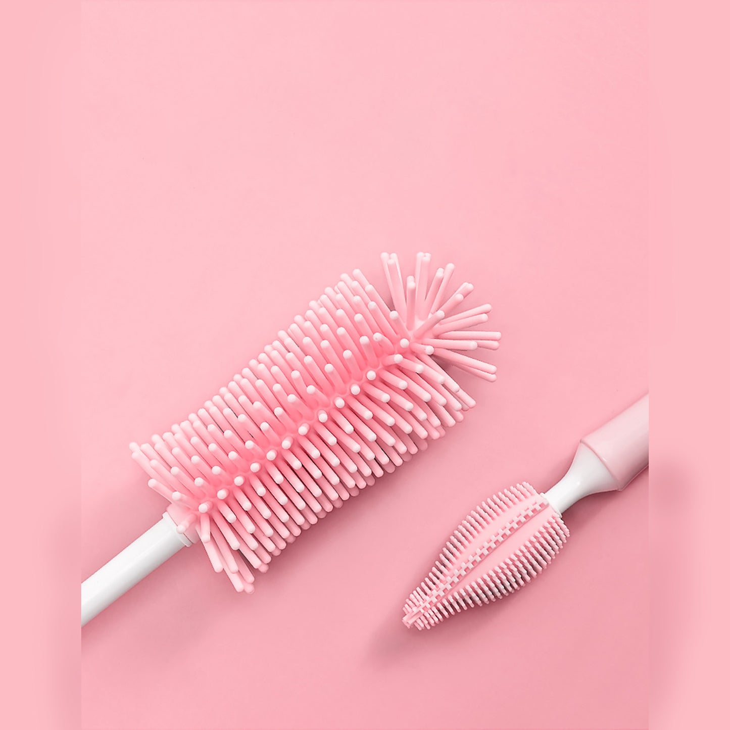 Pink baby bottle cleaning brush set with soft silicone bristles for thorough cleaning