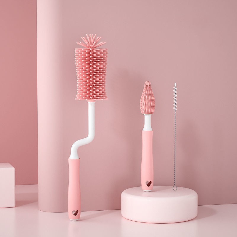 Pink baby bottle cleaning brush set with three different brushes for thorough bottle and nipple cleaning