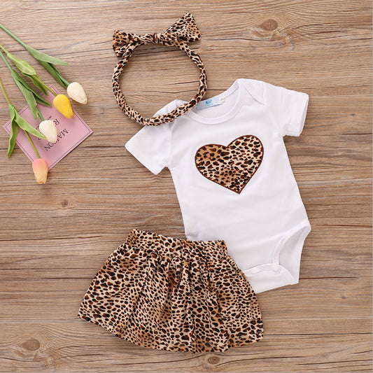 Baby clothing gift set leopard with white bodysuit heart print, leopard print skirt, and matching headband