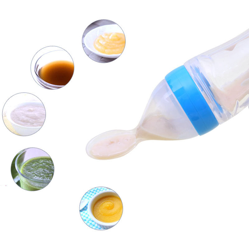 Clear baby food supplement feeder with blue ring dispensing different pureed baby foods