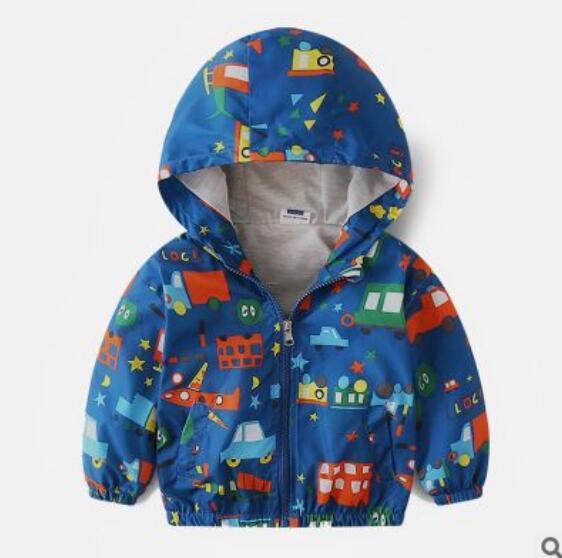 Blue boys hooded jacket with colorful vehicle and star prints, front zipper, and elastic cuffs