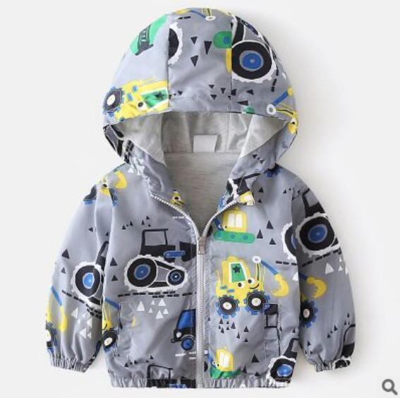 Boys hooded jacket with colorful construction vehicle print on gray fabric and front zipper