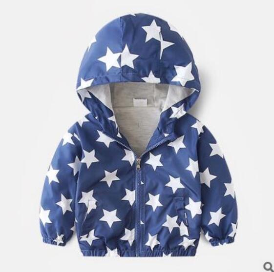 Blue boys hooded jacket with white star pattern and front zipper closure