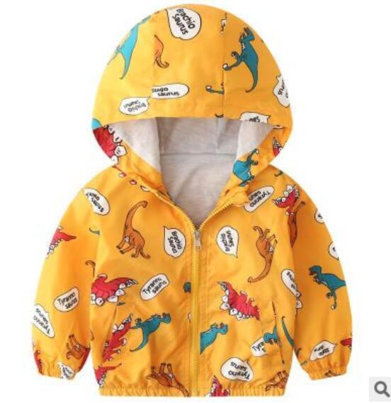 Bright yellow boys hooded jacket with colorful dinosaur prints and front zipper closure
