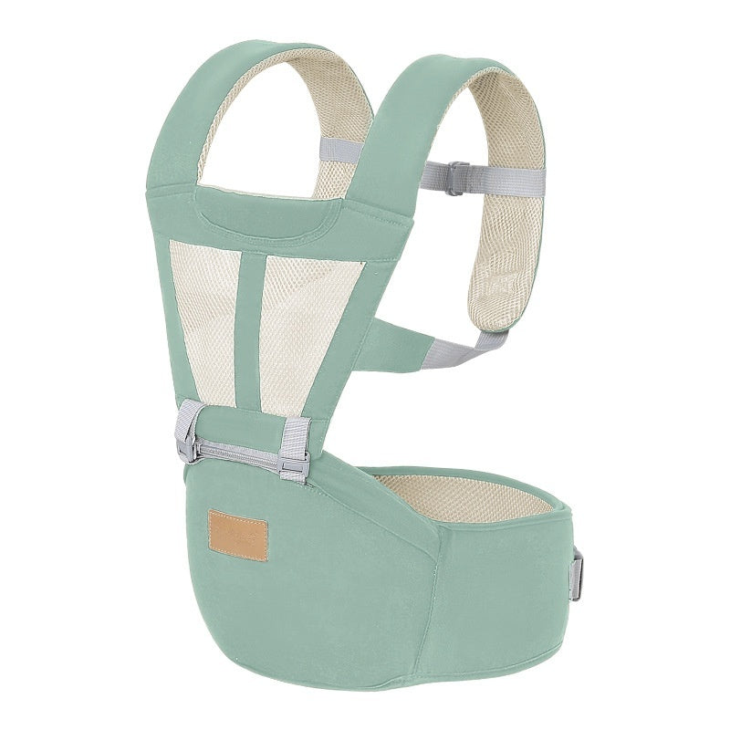 Breathable baby hip seat carrier in soft green with mesh panels for comfortable baby support