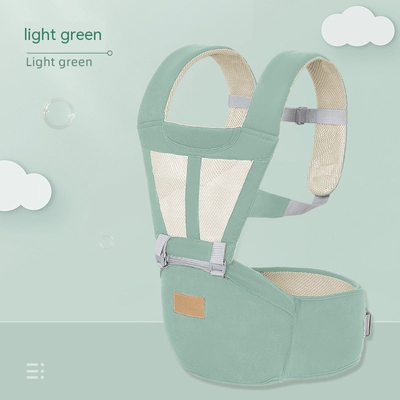 Light green breathable baby hip seat with mesh panels and padded straps for comfort