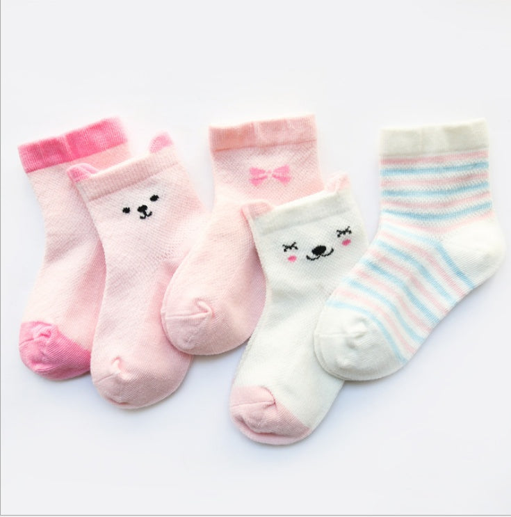 Cotton kids socks pack with five pairs featuring pink, white, and striped designs with cute animal faces