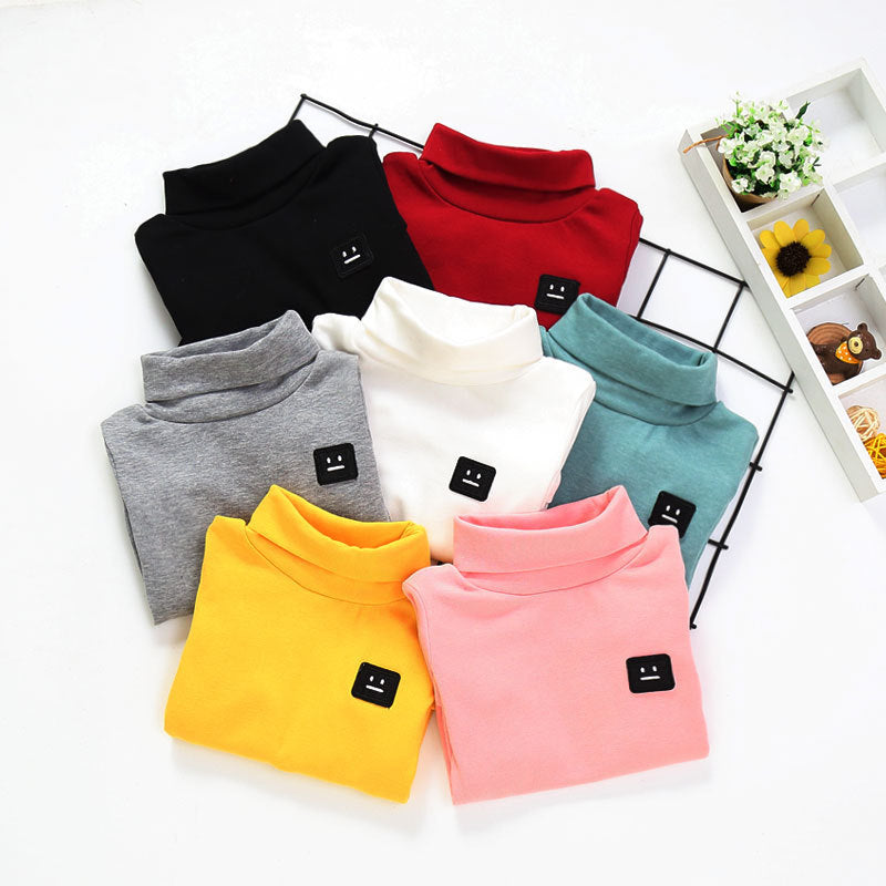 Assorted colorful cotton tops for toddlers with turtleneck design and smiley face patch