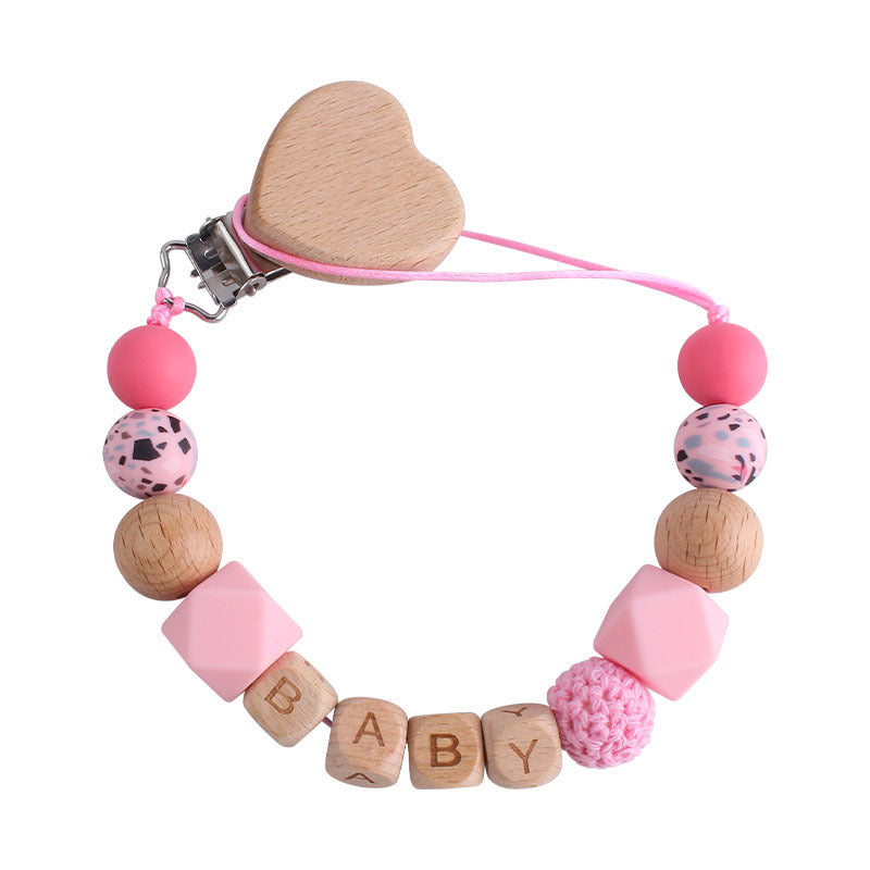 Cute baby pacifier chain with pink beads wooden blocks and heart-shaped clip