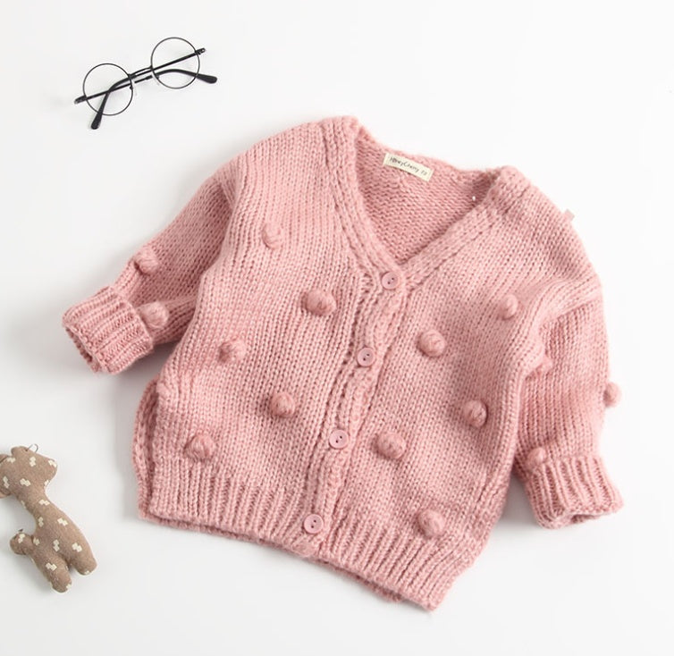 Pink knitted cute toddler cardigan for girls with bobble details and buttons