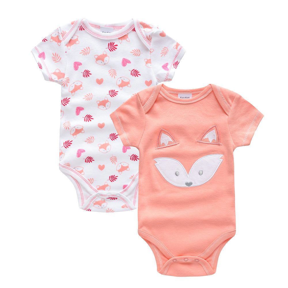 Set of two newborn summer onesies with fox designs in white and peach colors for infants