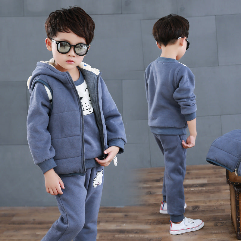 Stylish kids fleece sweater set in blue with hooded vest and matching pants worn by child model