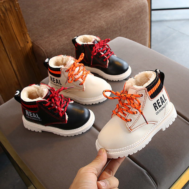 Boys and girls warm martin boots in black and white with orange and red laces and fur lining