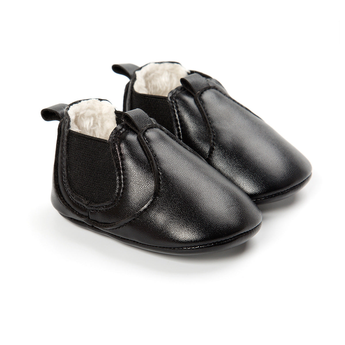 Black soft sole infant shoes with elastic sides and plush interior for comfort