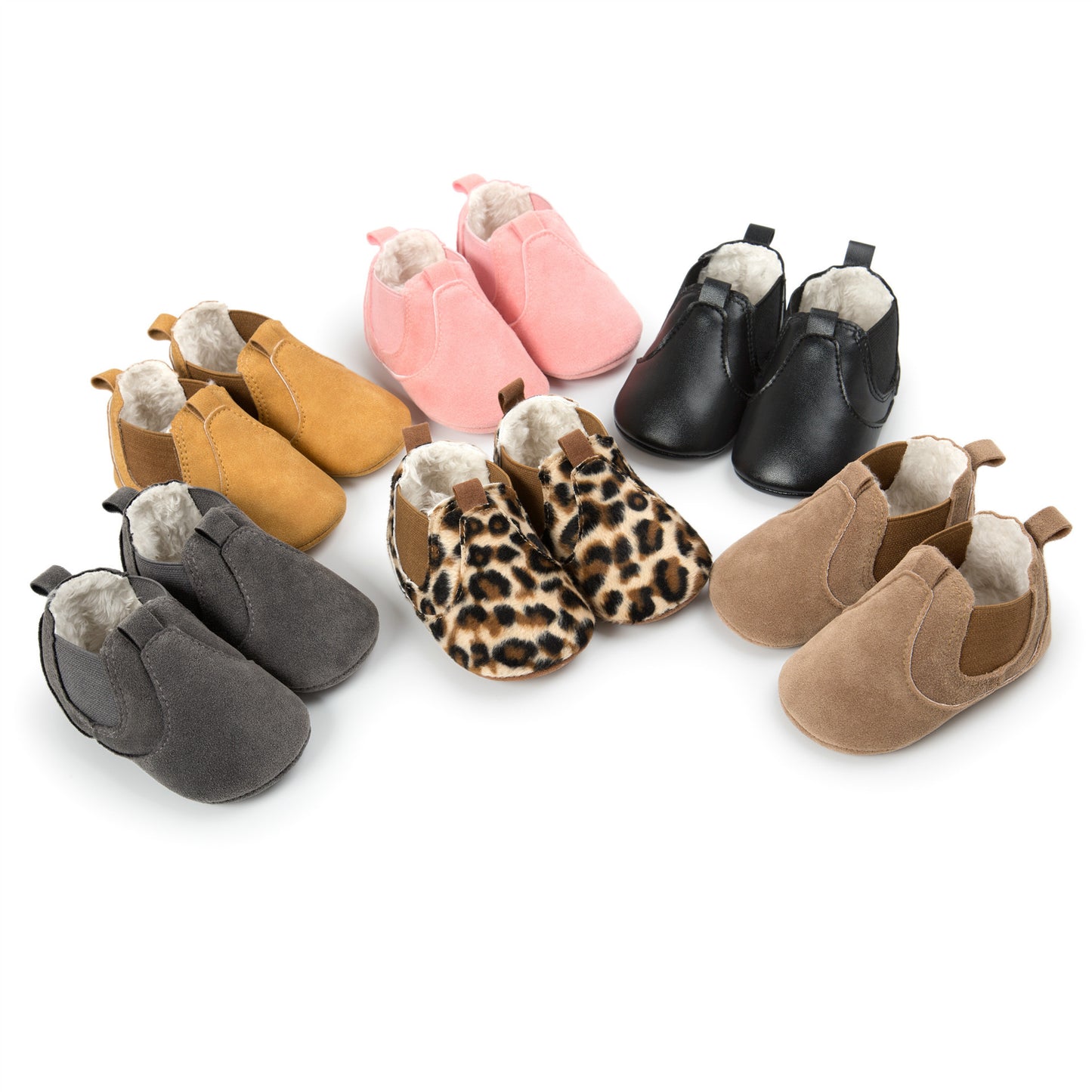 Collection of soft sole infant shoes in multiple colors including pink, black, leopard print, tan, gray, and brown with plush lining