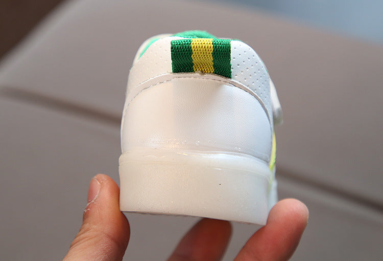 Back view of white toddler velcro light up sneakers with green and yellow stripe detail