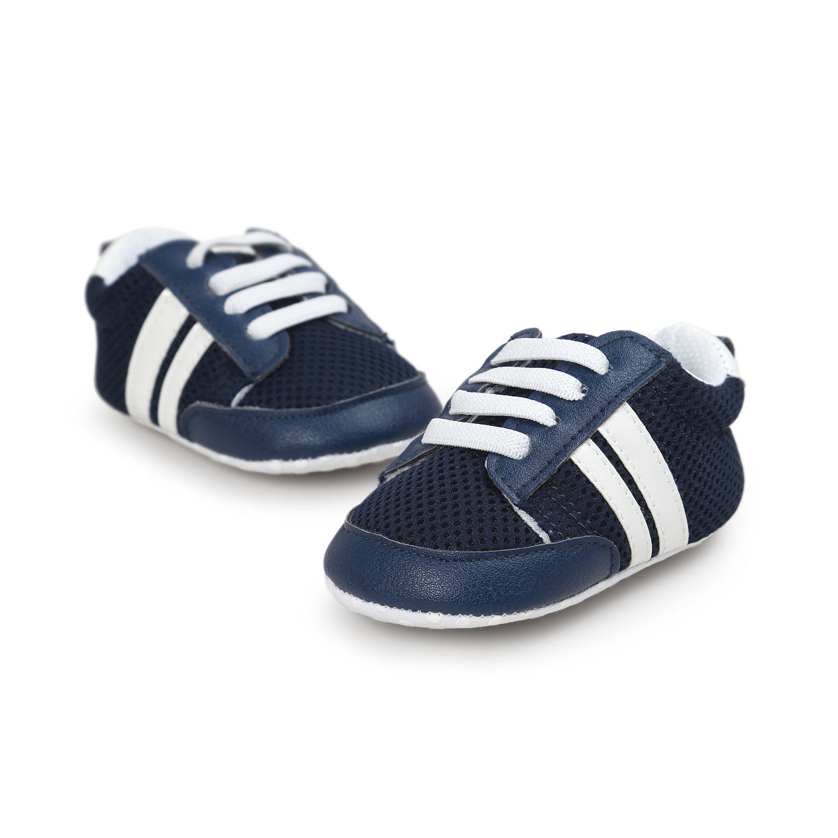 Navy blue infant moccasin shoes with white stripes and laces for comfortable baby wear