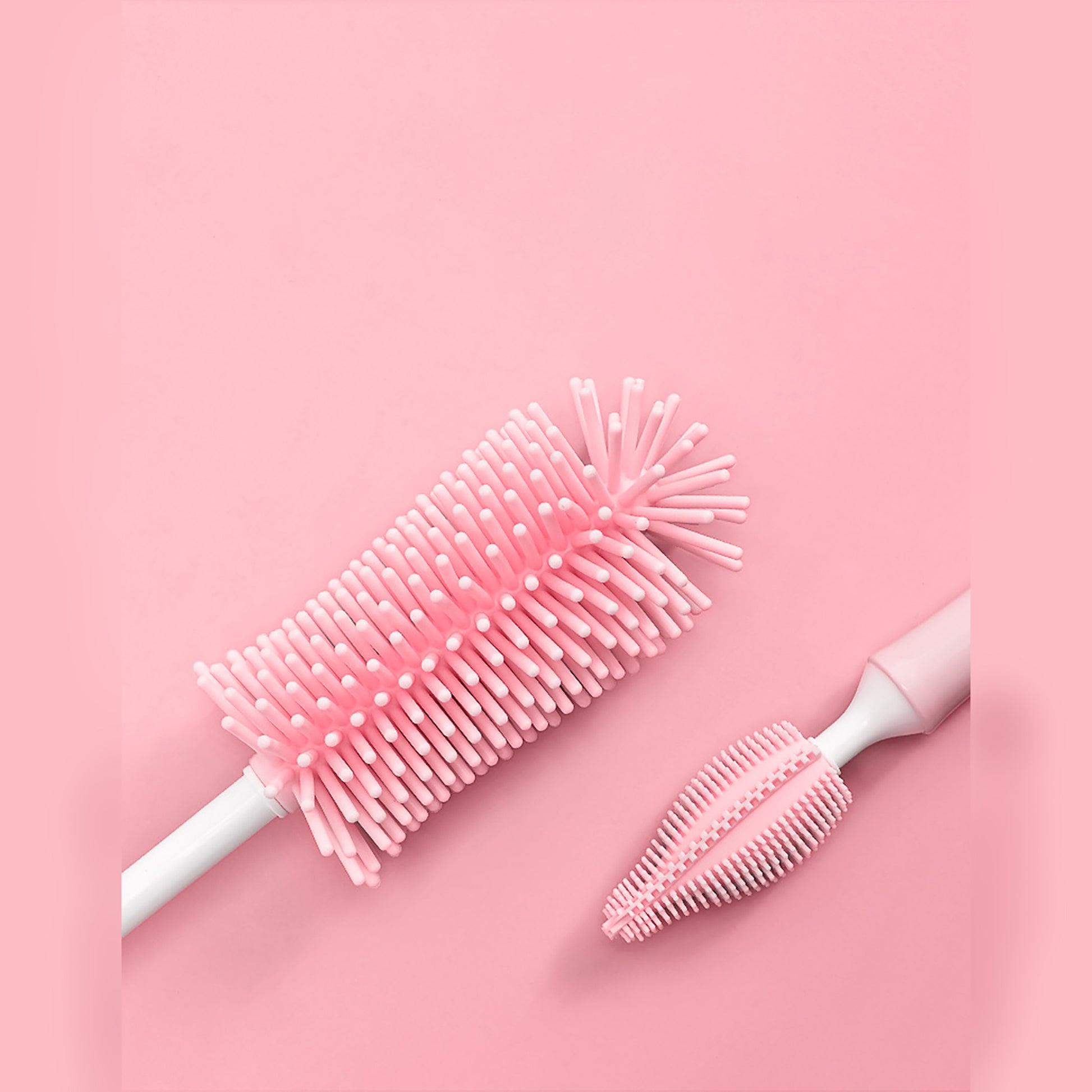 Pink baby bottle cleaning brush set with soft silicone bristles for thorough cleaning