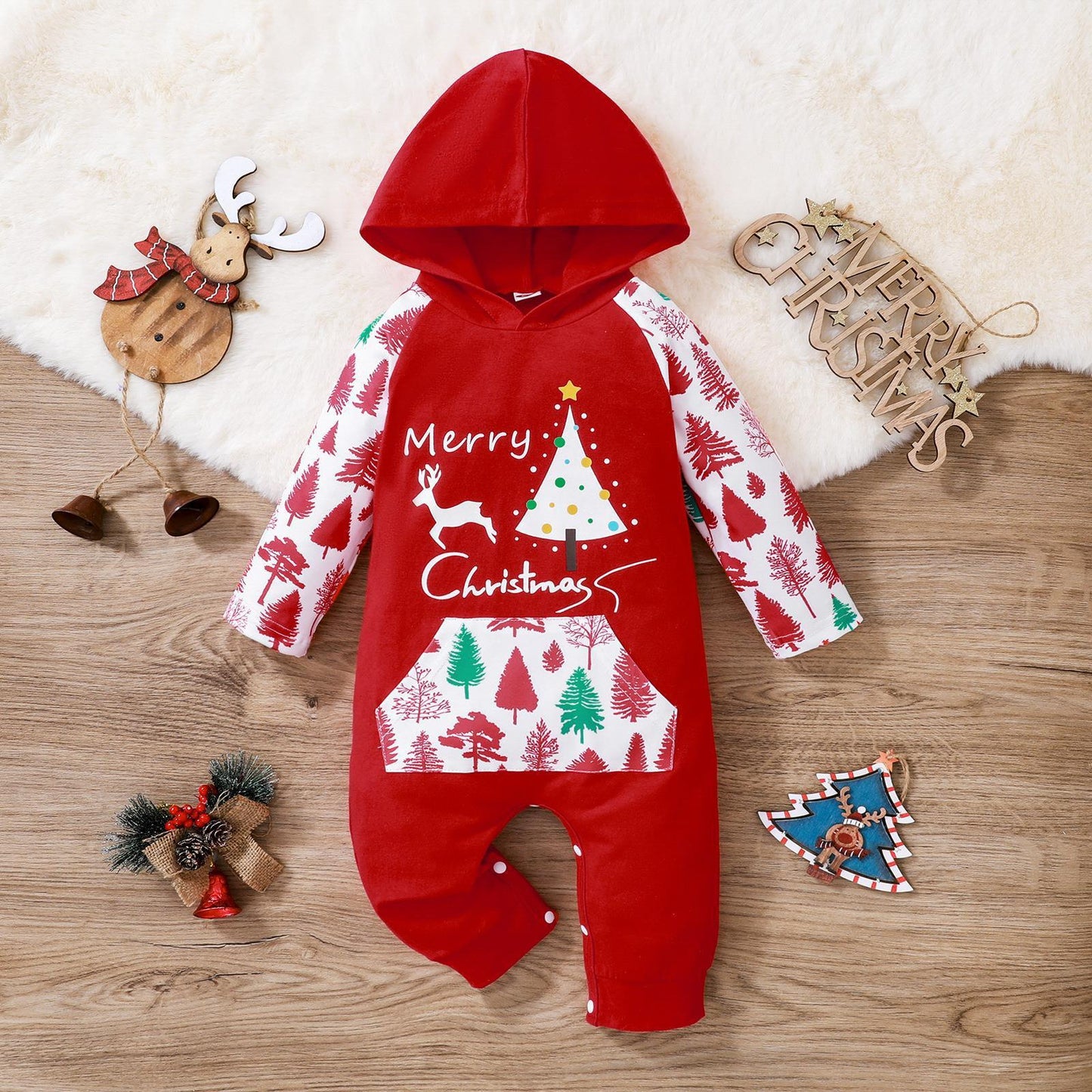 Red baby Christmas onesie with hood featuring a Christmas tree and reindeer design with festive tree print sleeves