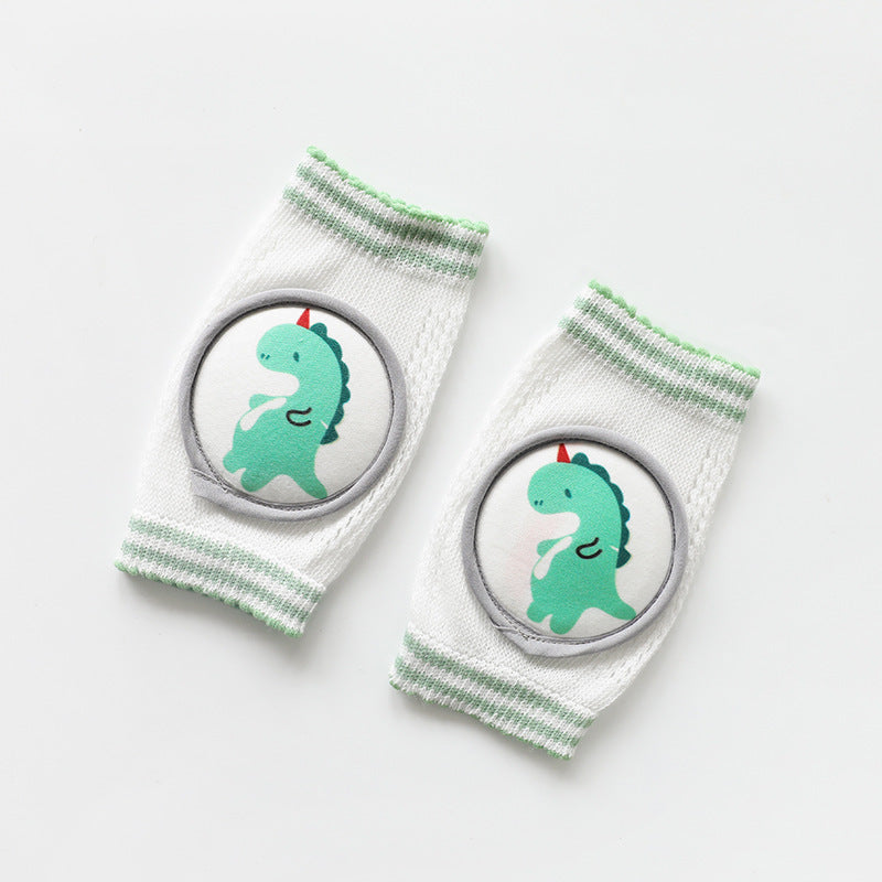 White baby knee pads for crawling with green dinosaur design and striped edges