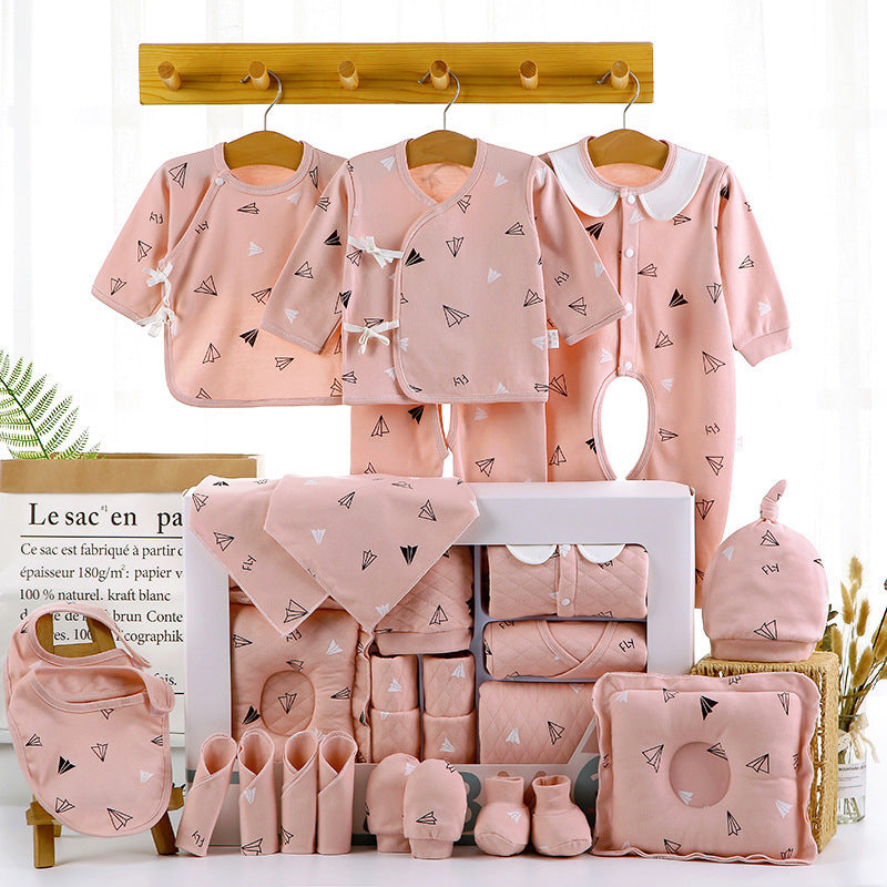 Pink baby shower gift cotton clothes set with multiple pieces including onesies hats mittens and bibs in a white gift box