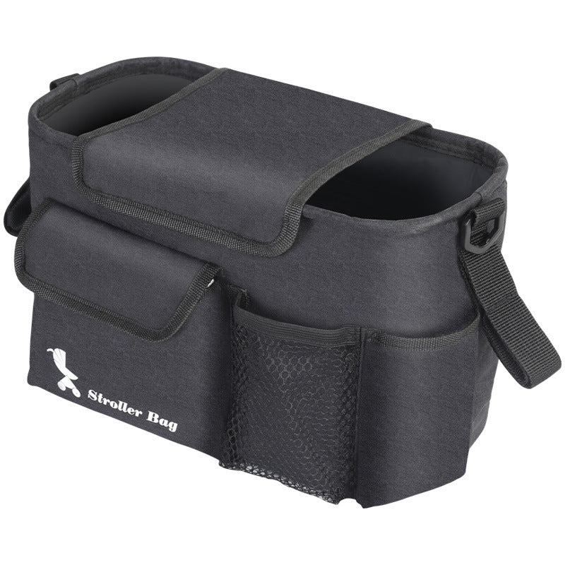 Black baby essentials organizer for stroller with multiple pockets and a secure flap closure