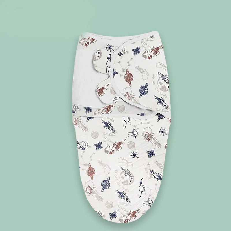 Cloud print newborn swaddle with space-themed illustrations in soft fabric