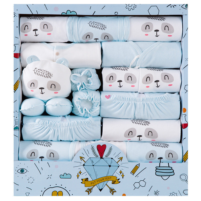 Cotton newborn gift set with blue and white bear-themed baby clothes and accessories in a decorative gift box