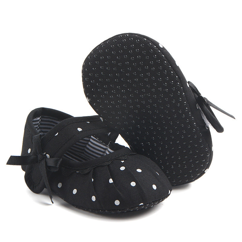 Black polka dot cute princess baby shoes with soft sole and bow detail for infants