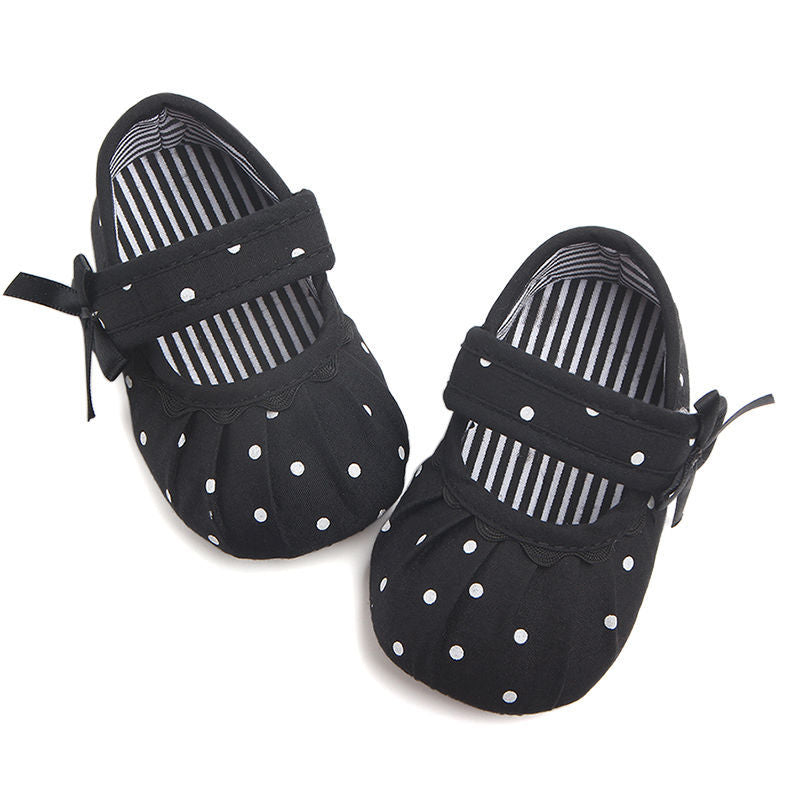 Black polka dot cute princess baby shoes with strap and bow detail for infants
