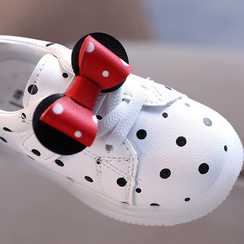White polka dot light up shoes for girls with a red bow and black mouse ears decoration