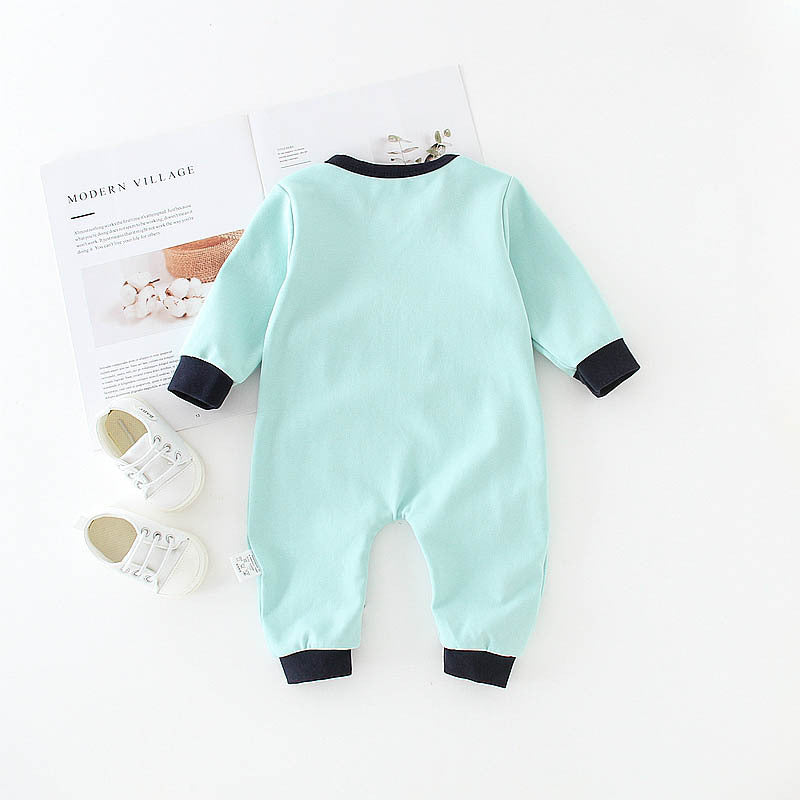 Back view of light blue elephant print baby onesie with black cuffs and collar laid flat with white baby shoes