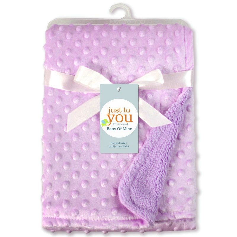 Soft newborn swaddle wrap in light purple with textured dots and a smooth satin ribbon