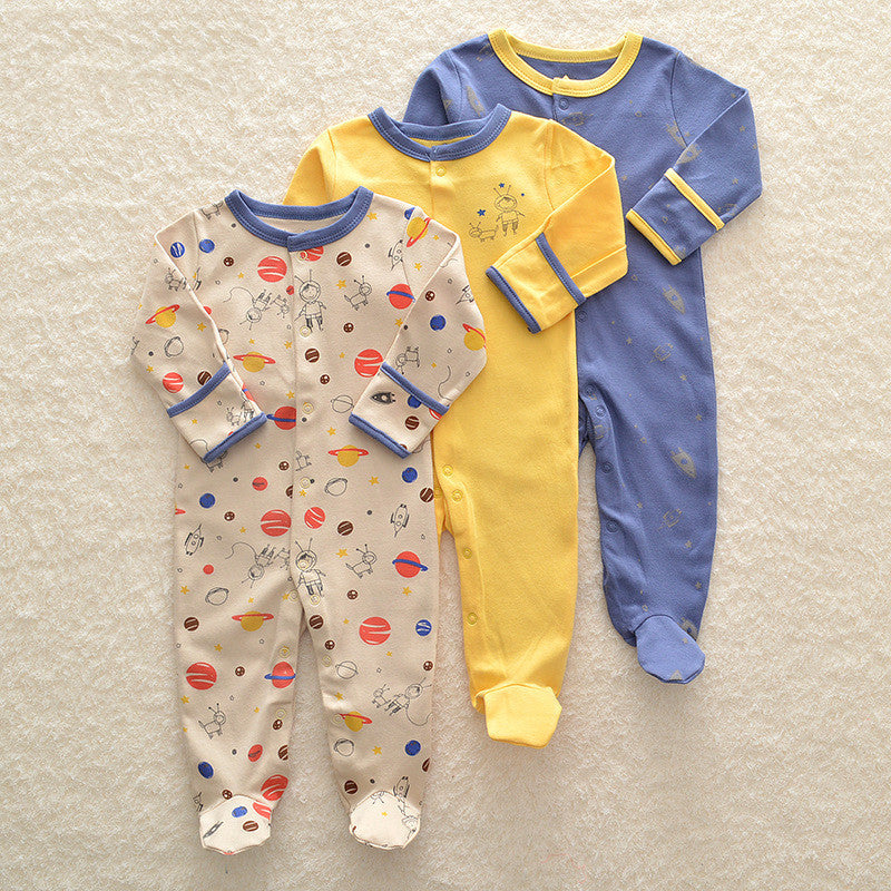 Set of three long sleeve baby onesie with space-themed prints and solid colors in yellow blue and beige