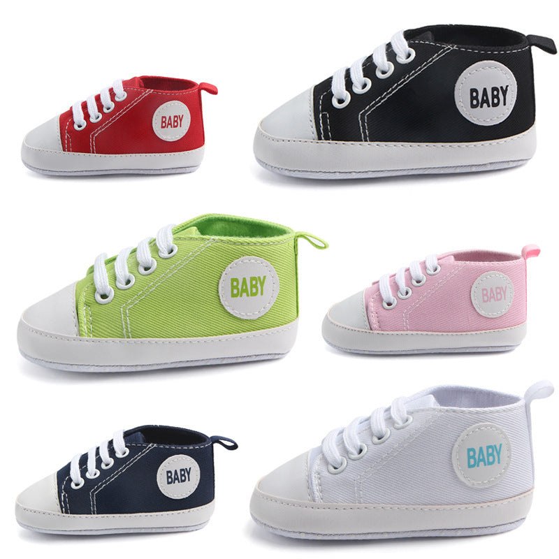 Collection of soft sole baby sneakers in red black green pink navy and white with white laces