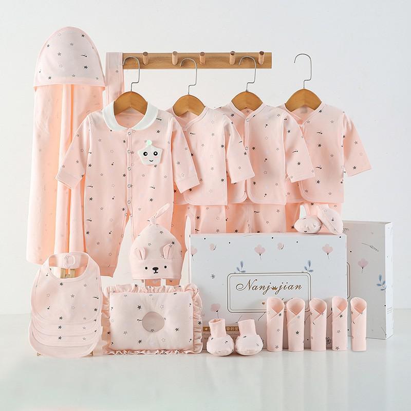 Newborn baby clothes gift set in soft peach with multiple outfits mittens hat bib and blanket in gift box