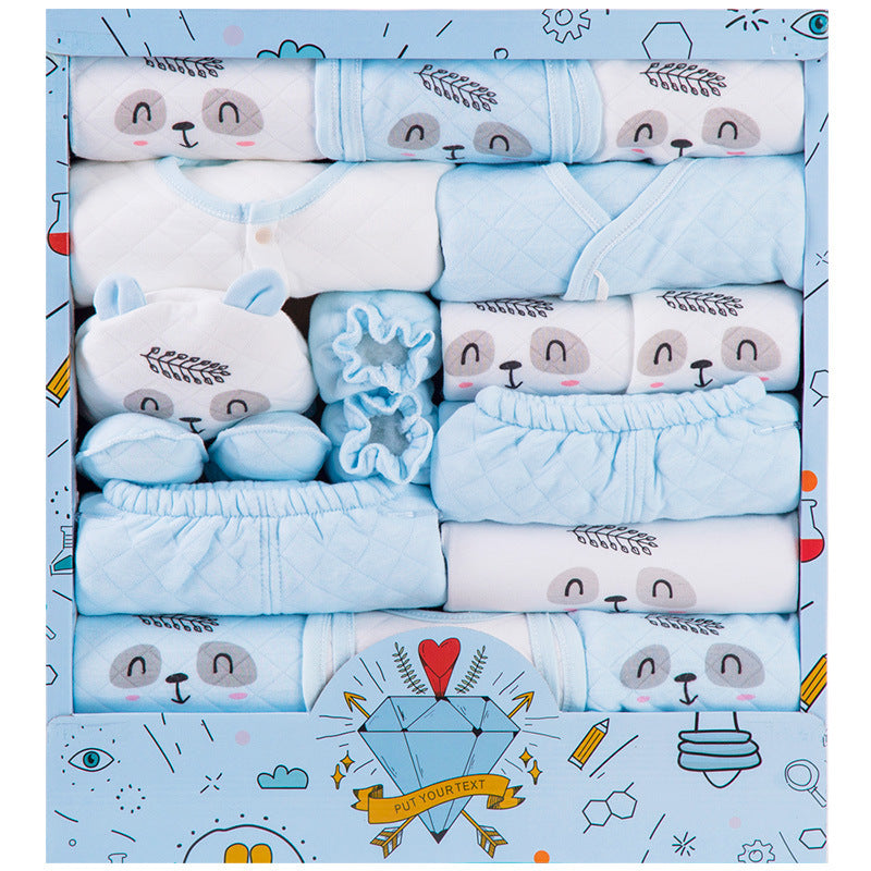 Blue and white newborn gift box with panda print clothing and accessories neatly arranged