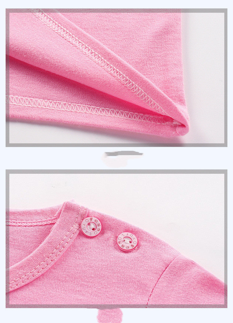 Close-up details of pink toddler sweater top showing stitching and button closure on shoulder