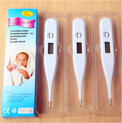 Reliable fever thermometer for babies with digital display and fast 1 minute readout next to product box