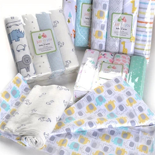 Soft baby bedding sets with colorful animal prints including elephants, lions, and giraffes on sheets