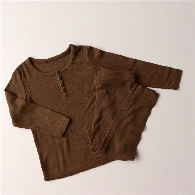 Brown soft cotton pajamas for toddlers with long sleeves and buttoned neckline set