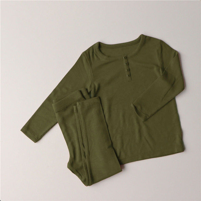 Soft cotton pajamas for toddlers in olive green with long sleeves and button details
