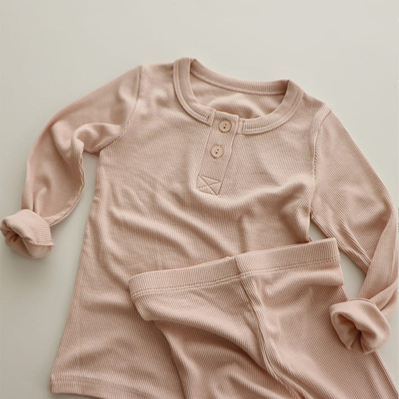 Beige soft cotton pajamas for toddlers with long sleeves and button-up collar