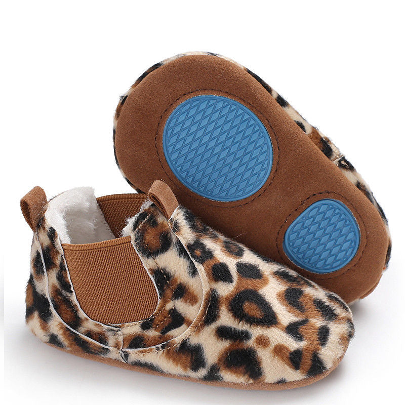Leopard print soft sole infant shoes with cozy interior and flexible blue grip soles