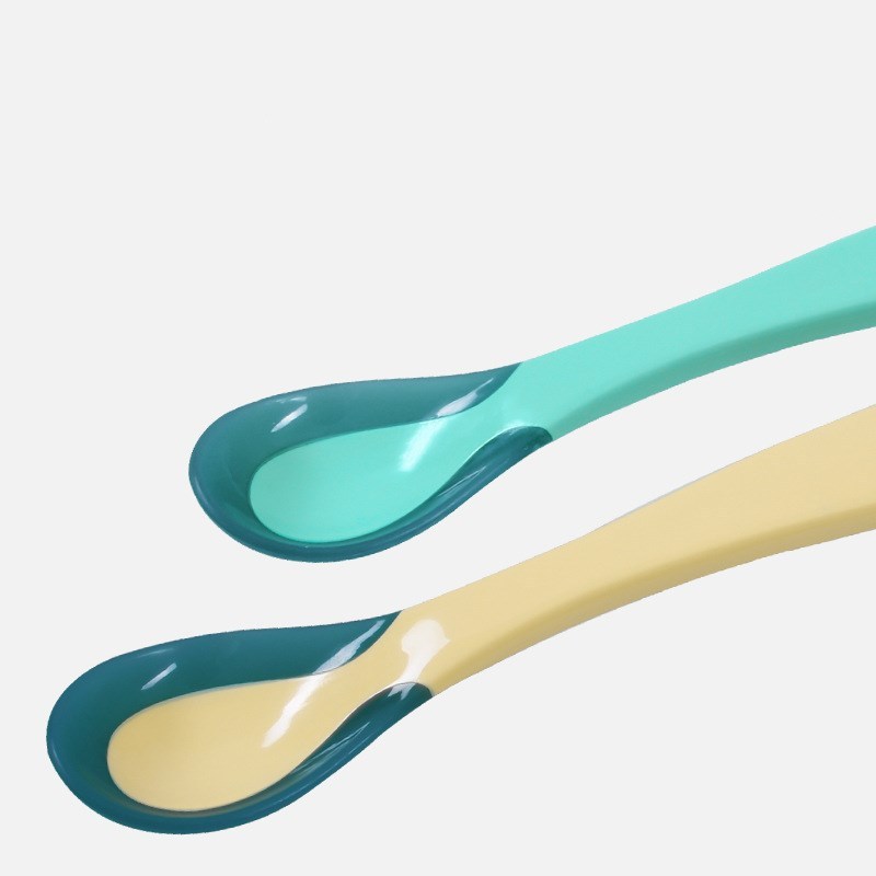 Two baby feeding spoons with soft tip spoon for babies in teal and yellow colors