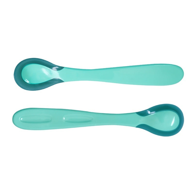 Blue soft tip spoon for babies with ergonomic handle designed for comfortable feeding