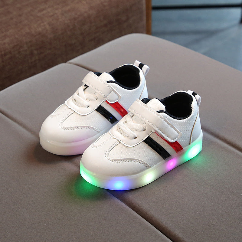 White toddler velcro light up sneakers with red and black stripes and multicolor glowing soles