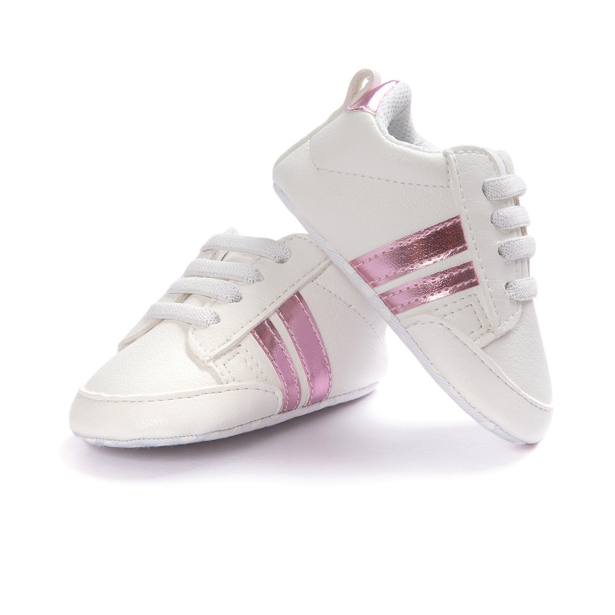 White infant moccasin shoes with pink metallic stripes and soft laces for babies